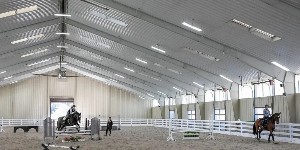 indoor-steel-equestrian-arena-with-show-jumping-training