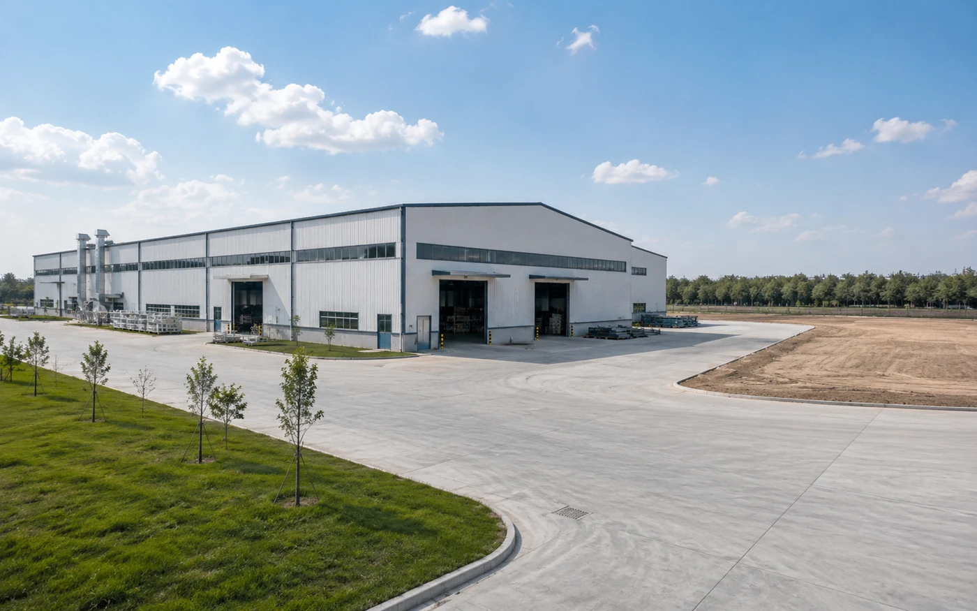 Industrial steel building with site space reserved for future growth