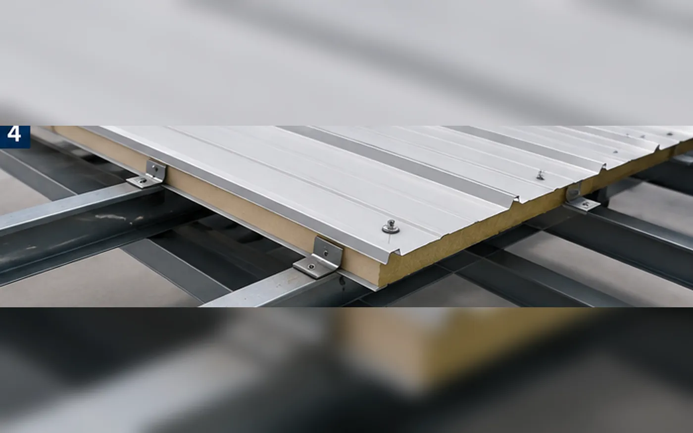 Roof sandwich panel fastener and steel purlin support detail