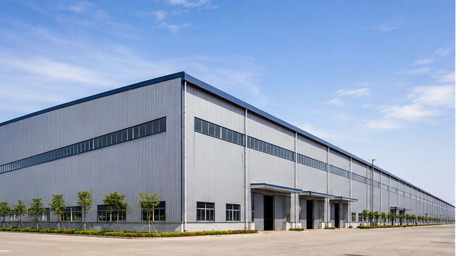 long industrial steel warehouse exterior